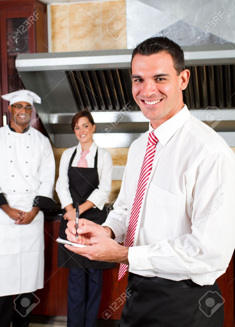 Restaurant Kitchen Manager stock photo happy male restaurant manager and his staff in kitchen Restaurant Kitchen Manager stock photo happy male restaurant manager and his staff in kitchen