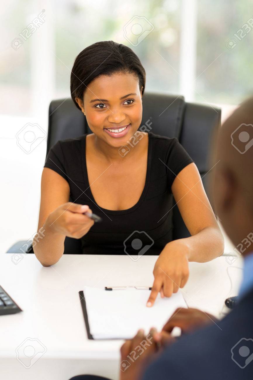 https://previews.123rf.com/images/michaeljung/michaeljung1410/michaeljung141000241/32519169-professional-african-businesswoman-giving-her-business-partner-a-contract-for-signing.jpg