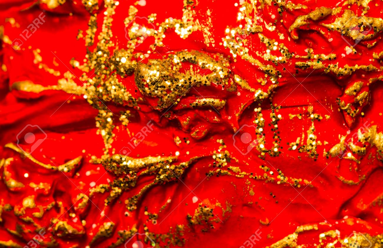 赤と金はキラキラ テクスチャ背景です。抽象化します。の写真素材