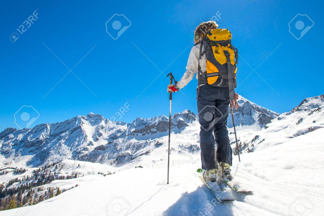 Girl makes ski mountaineering, ski trails Randonnee - 38497584 Girl makes ski mountaineering, ski trails Randonnee - 38497584