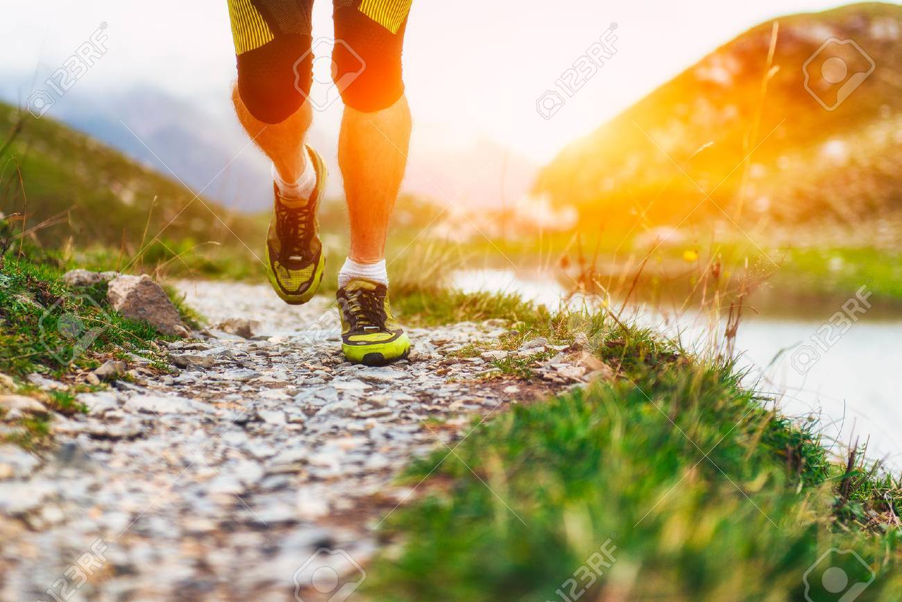 Particularly on the shoes of a runner in the mountains - 44623297 Particularly on the shoes of a runner in the mountains - 44623297