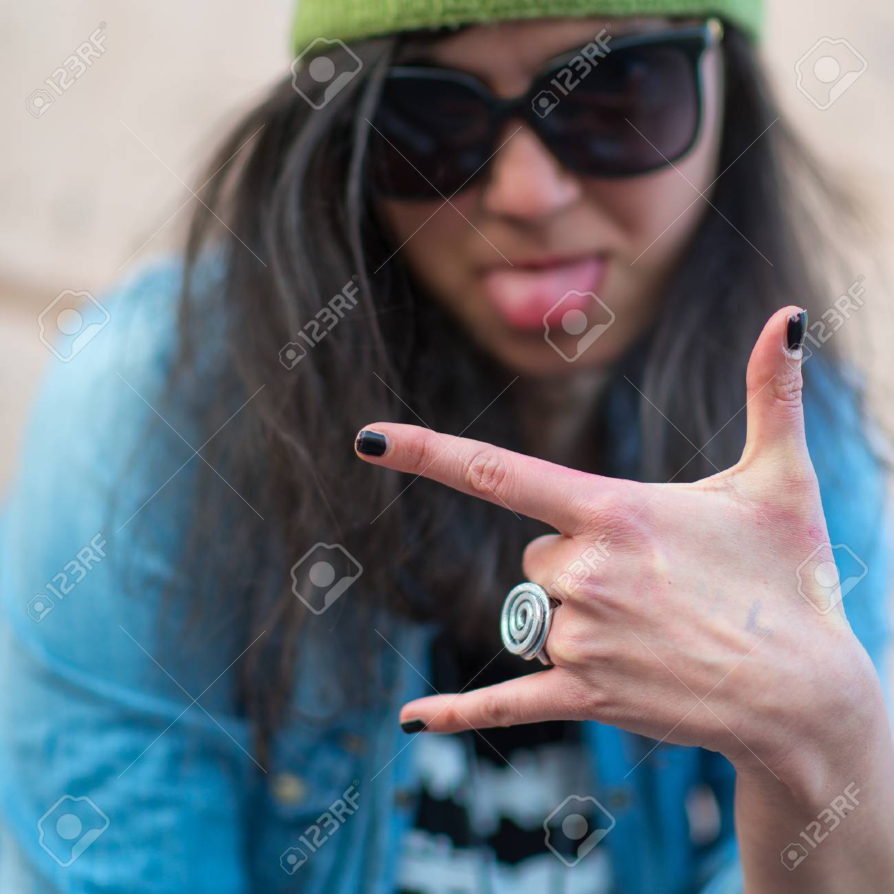 Hip hop rap girl with three fingers - 54848703 Hip hop rap girl with three fingers - 54848703