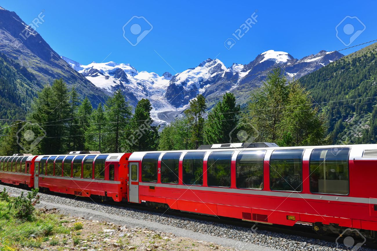 Swiss mountain train Bernina Express crossed Alps with glaciers in the backgroundin the summer - 64502496 Swiss mountain train Bernina Express crossed Alps with glaciers in the backgroundin the summer - 64502496