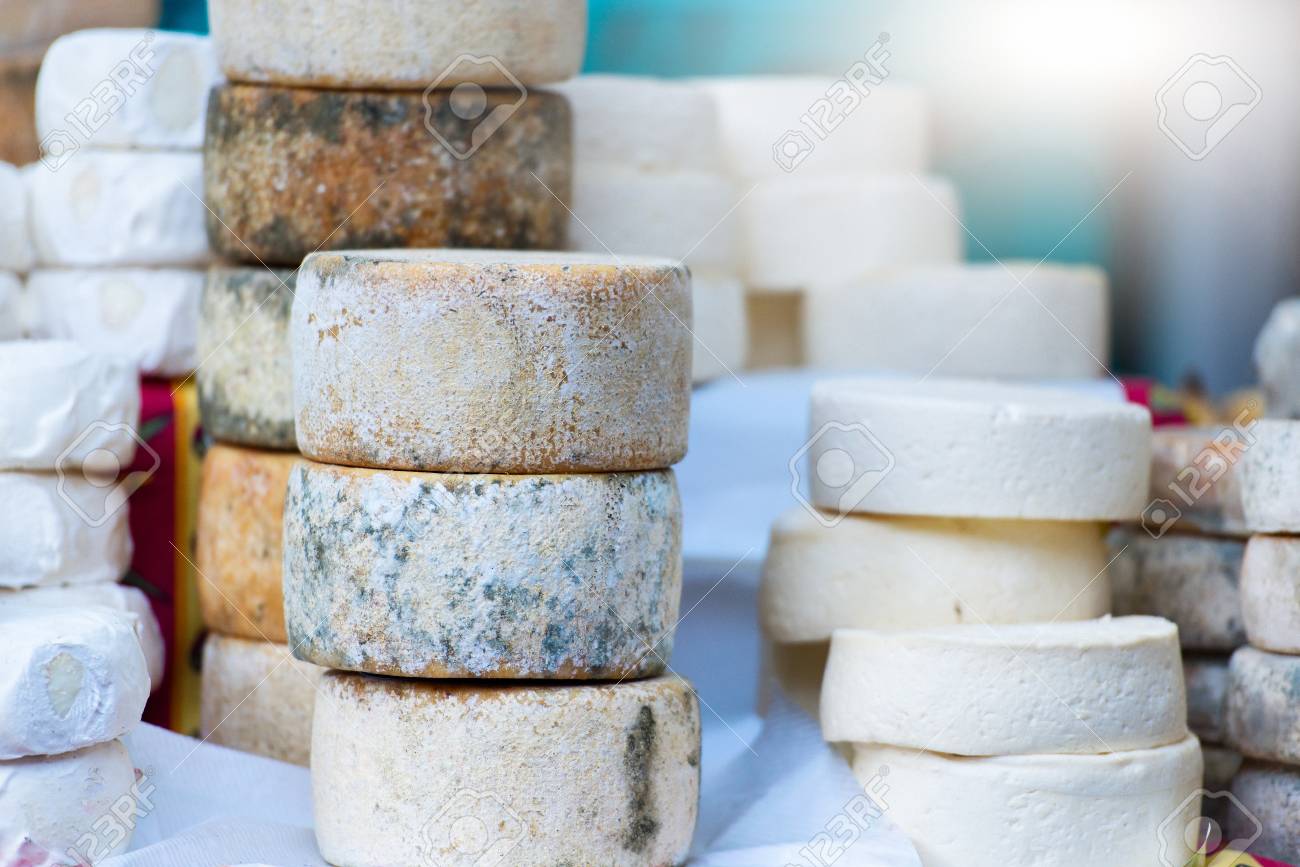 Traditional artisan cheese wheels composition. - 86584281 Traditional artisan cheese wheels composition. - 86584281