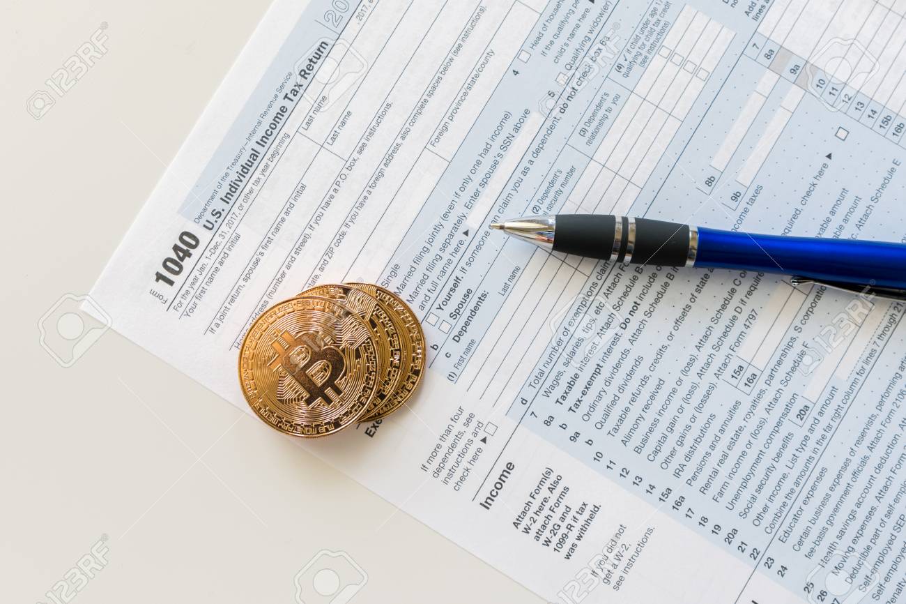 IRS 1040 Tax Form Used To Calculate Capital Gain Or Loss For Bitcoin  Trading Stock Photo, Picture and Royalty Free Image. Image 115021438.
