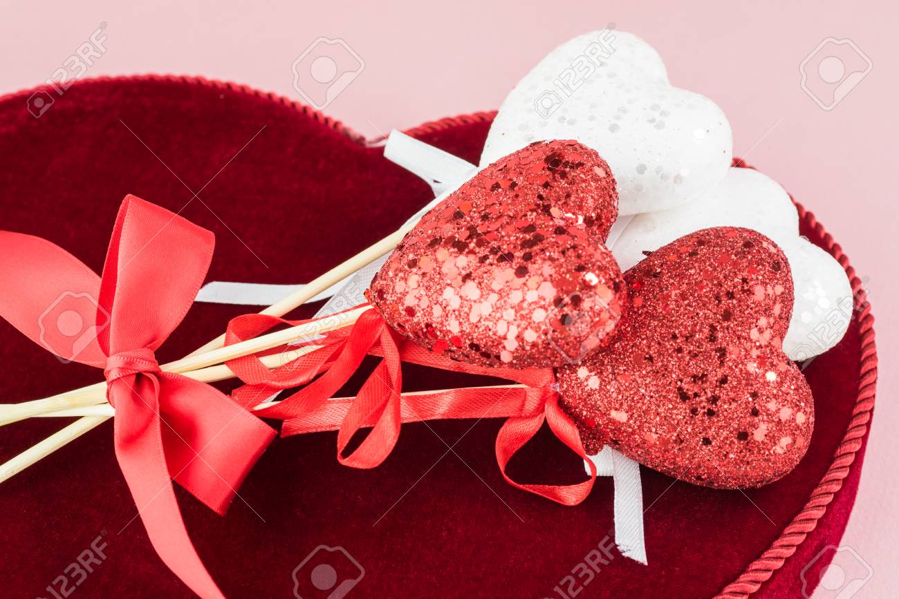 Close Up Of Heart Shaped Candy Box With Chocolate Candies On