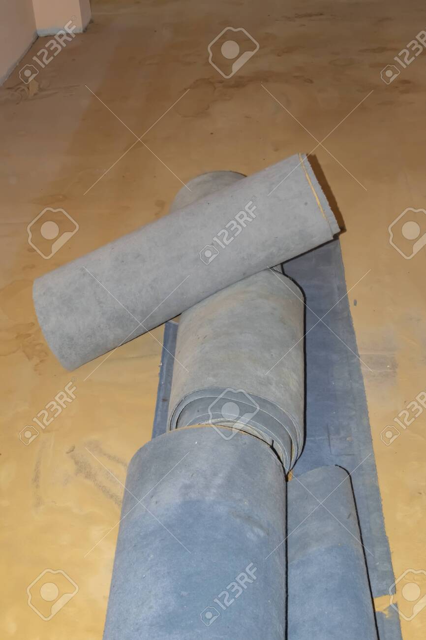 Carpet Leftovers In A Living Room After Being Removed To Lay