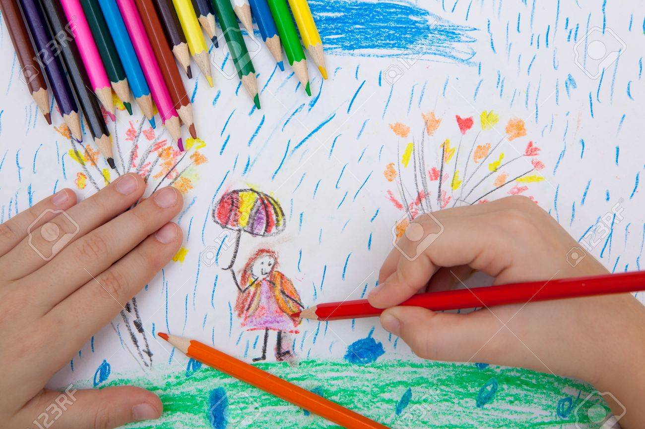 The Child Draws A Pencil Drawing Of A Girl With An Umbrella In Stock Photo Picture And Royalty Free Image Image 6911 The Child Draws A Pencil Drawing Of A Girl With An Umbrella In Stock Photo Picture And Royalty Free Image Image 6911