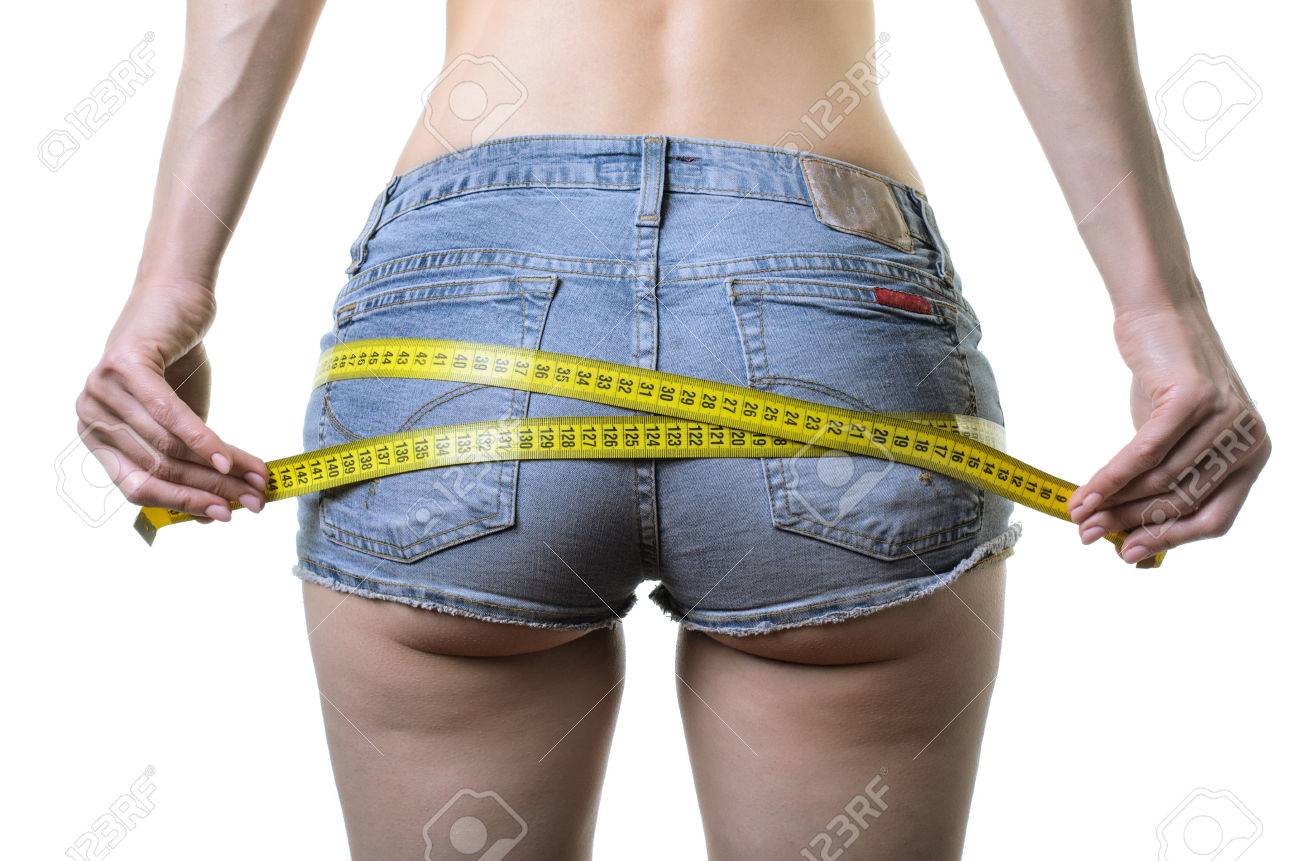 Stock Photo Young Woman Measures The Buttocks With A Measuring Tape Isolated On White Female Ass And Measuring Tape Stock Photo Young Woman Measures The Buttocks With A Measuring Tape Isolated On White Female Ass And Measuring Tape