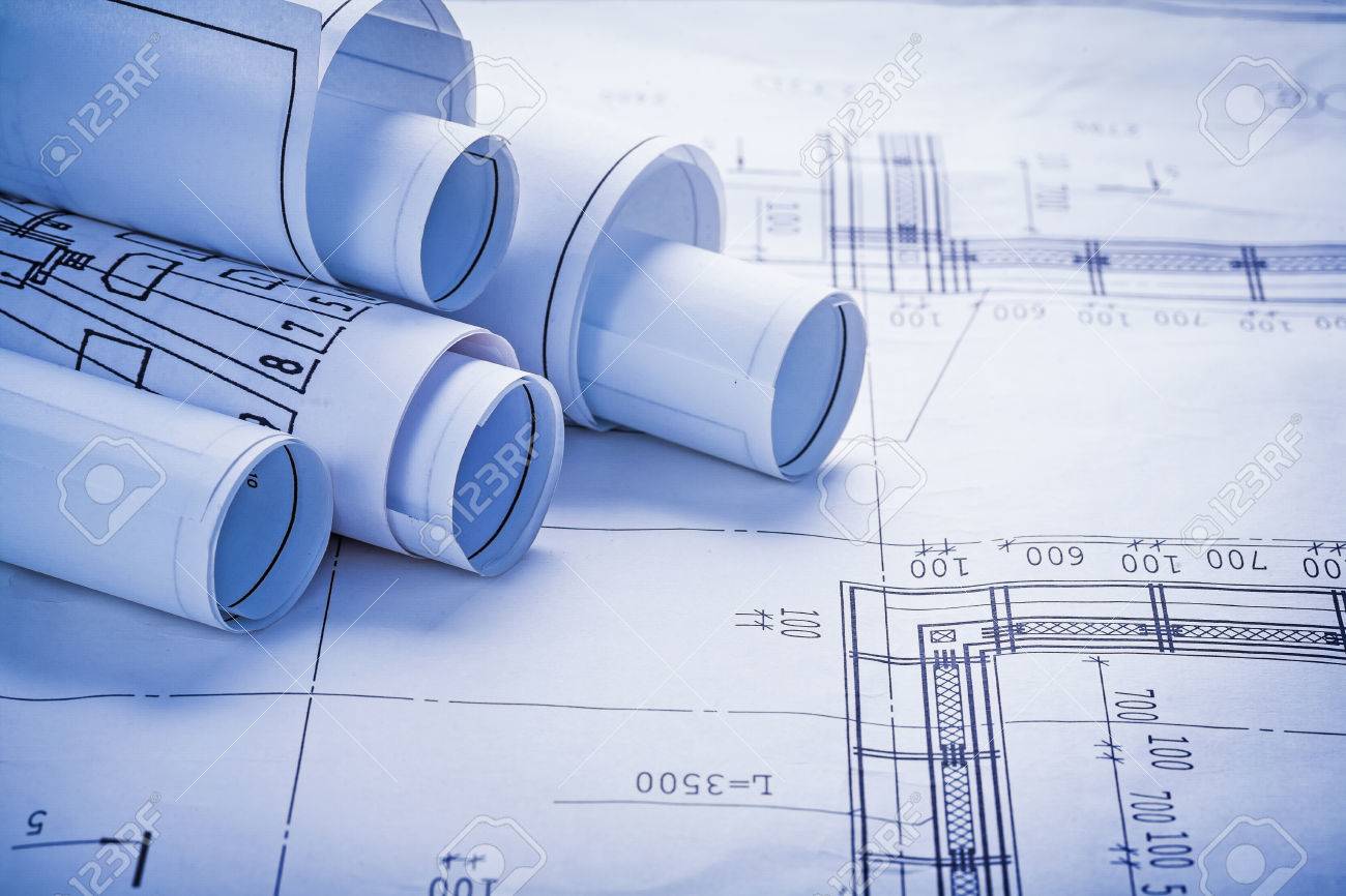Small Stack Of White Rolled Up Blueprints Horizontal Version Stock Photo,  Picture and Royalty Free Image. Image 38239625.