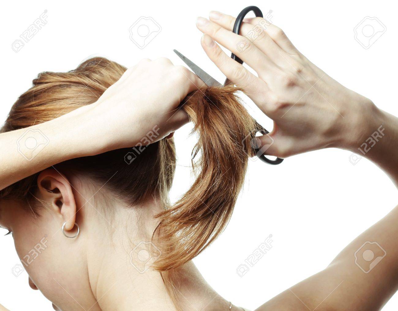 Young Woman With Scissors Going To Cut Her Hair Stock Photo