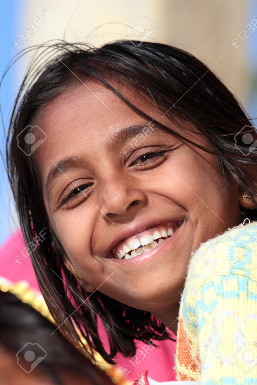 JAISALMER, INDIA - NOVEMBER 28, 2012: Portrait of happy village indian girl - 25486048 JAISALMER, INDIA - NOVEMBER 28, 2012: Portrait of happy village indian girl - 25486048