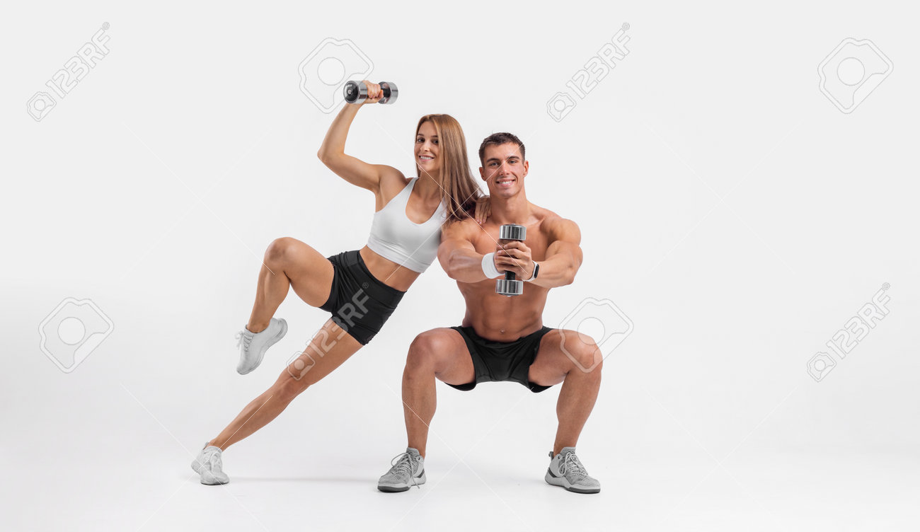 Fit Couple At The Gym Isolated On White Background. Fitness Concept.  Healthy Life Style. Fitness-Related Materials For Your Social Media  Marketing Campaigns Stock Photo, Picture and Royalty Free Image. Image  192545497., image size:1300x752