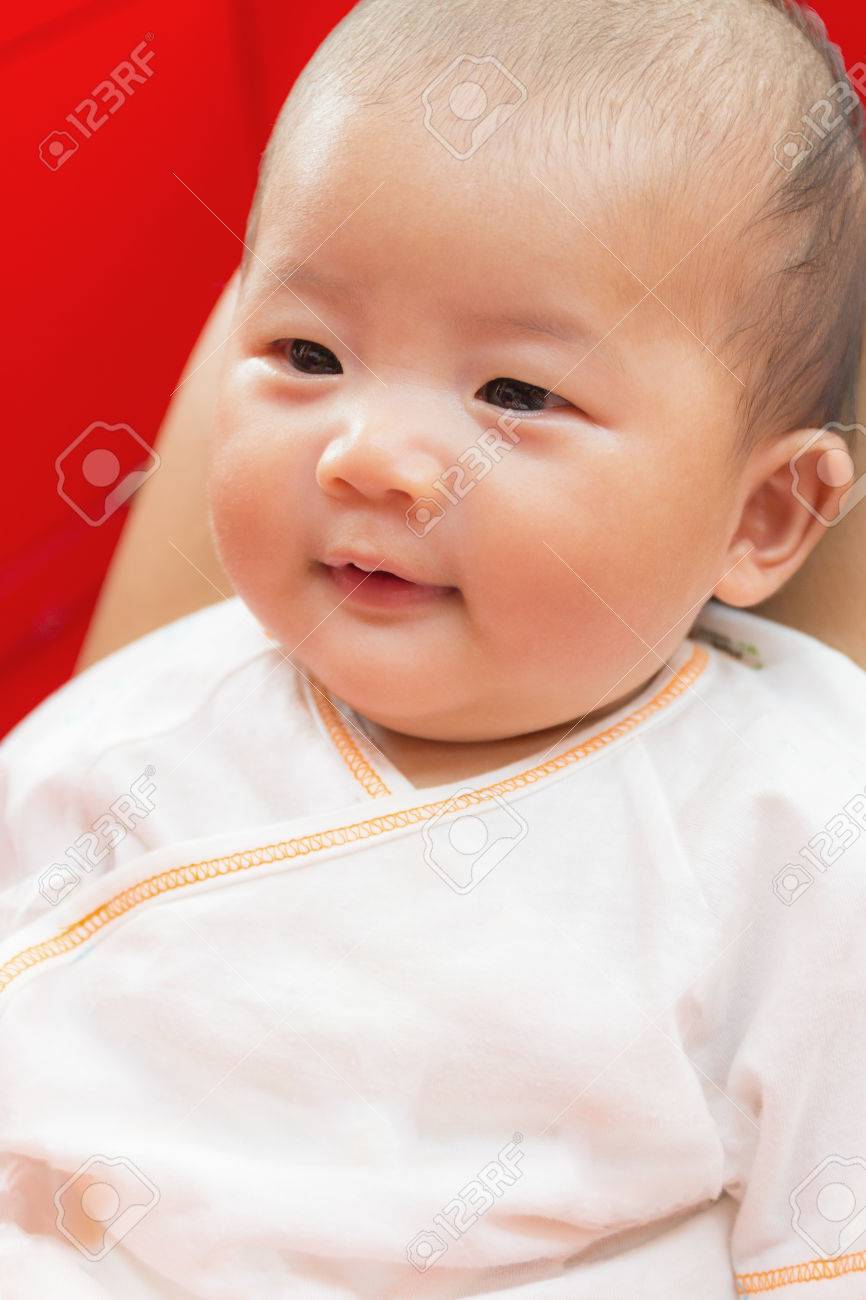 Close Up Two Month Old New Born Asian Cute Baby Smile Rests Happily On White Bed Background Stock Photo Picture And Royalty Free Image Image