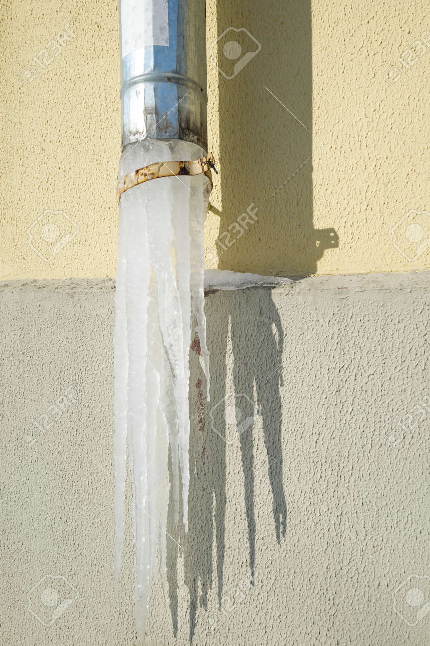 large icicle on a light background close-up - 170592610 large icicle on a light background close-up - 170592610