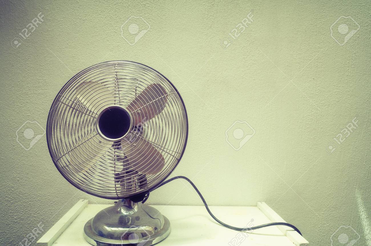 Old Steel Fan Grunge Wall On Background Vintage 1950s Style