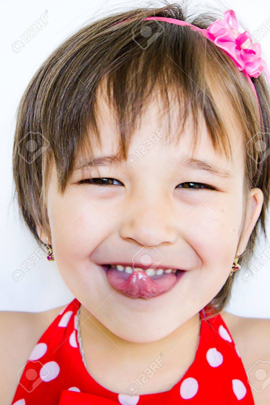 Little Girl Is Showing A Tongue Stock Photo, Picture and Royalty Free  Image. Image 14184640., image size:866x1300