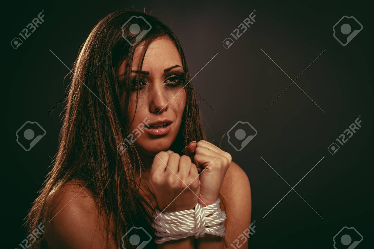 Milan MarkovicDesperate Kidnaped Woman Tied With Rope photo