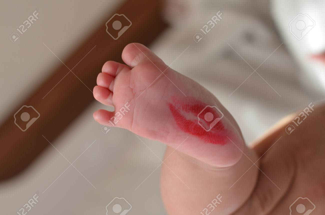 Red Lipstick Kiss On Cute Baby Leg Stock Photo Picture And Royalty