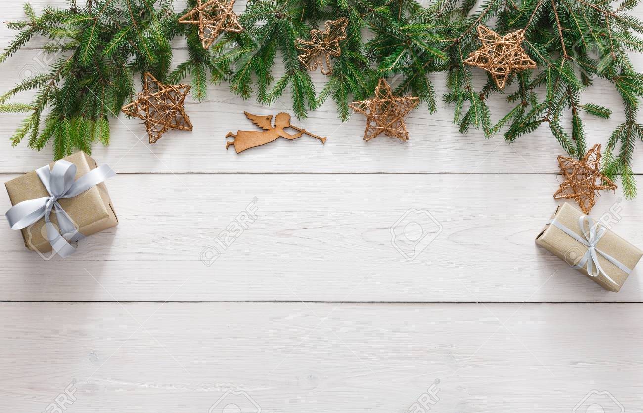 Christmas decoration, gift boxes, garland and angel figure frame..