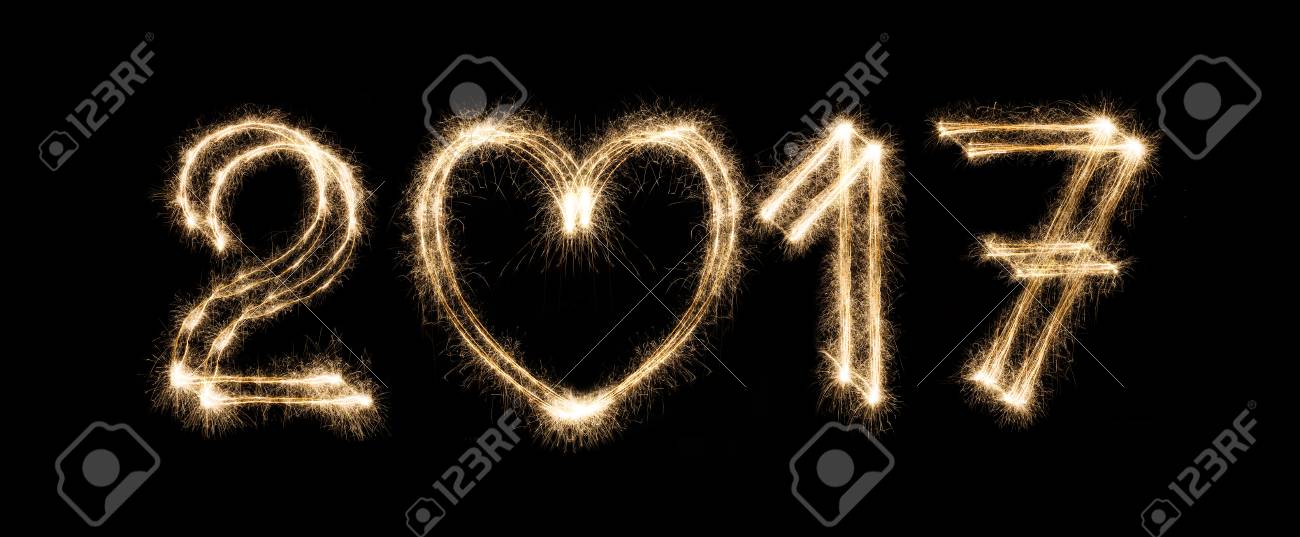 17 New Year Text From Sparkler Firework On Black Background With Heart Shape Love Symbol And Greeting Two Thousand Seventeen Numbers Illuminated Date Figures For Calendar Stock Photo Picture And Royalty Free 17 New Year Text From Sparkler Firework On Black Background With Heart Shape Love Symbol And Greeting Two Thousand Seventeen Numbers Illuminated Date Figures For Calendar Stock Photo Picture And Royalty Free