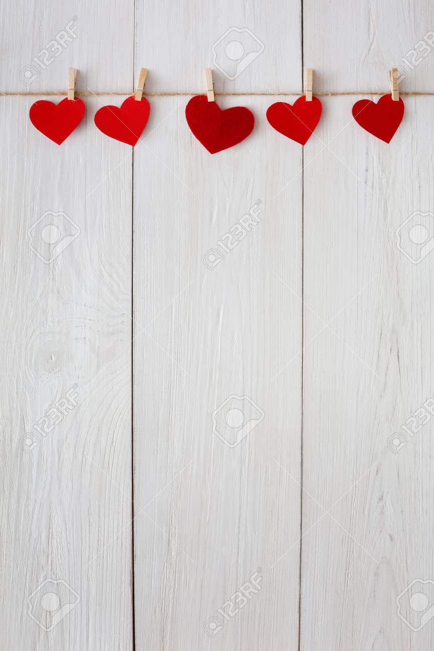 Valentine Background With Red Paper Hearts Row Border On Clothespins Stock Photo Picture And Royalty Free Image Image 68853967