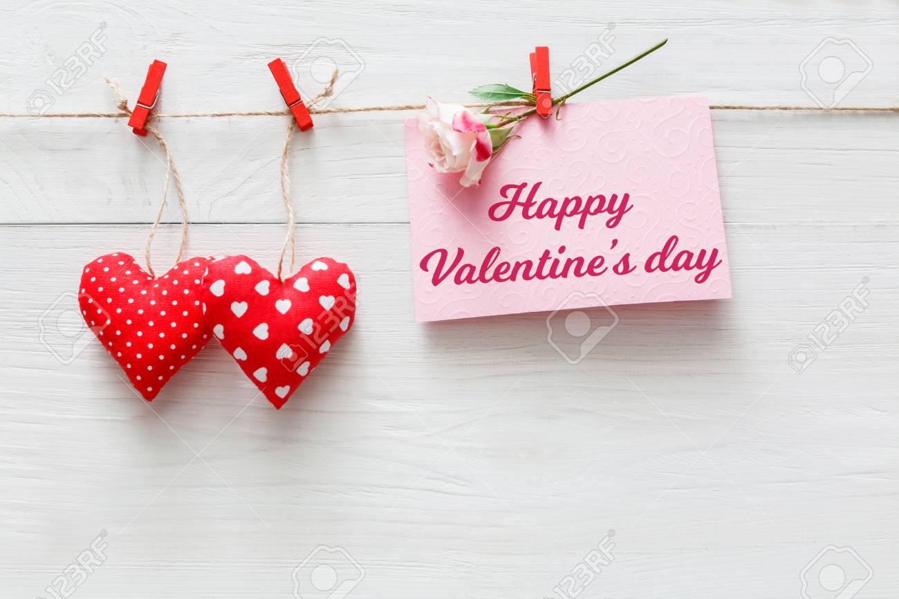 Happy Valentine Background With Red Pillow Sewed Hearts Row Border On Clothespins And Greeting Card Happy Valentine Background With Red Pillow Sewed Hearts Row Border On Clothespins And Greeting Card