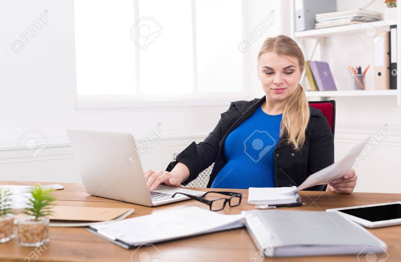 Pregnant Business Lady At Work Treading Papers Busy Expectant Businesswoman Sitting Her Working Place Pregnant Business Lady At Work Treading Papers Busy Expectant Businesswoman Sitting Her Working Place