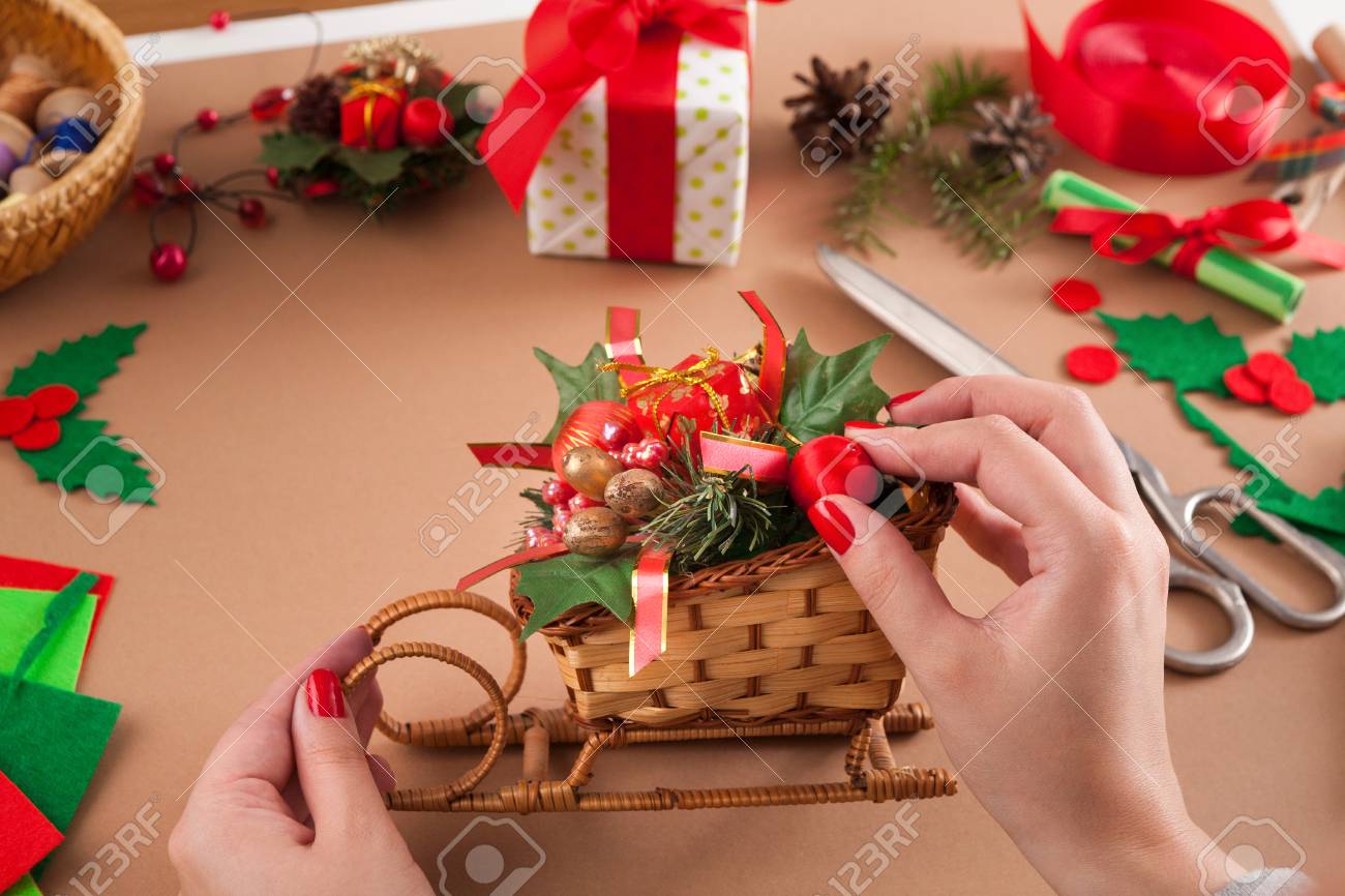 making handmade craft christmas ornaments sleigh with gift box