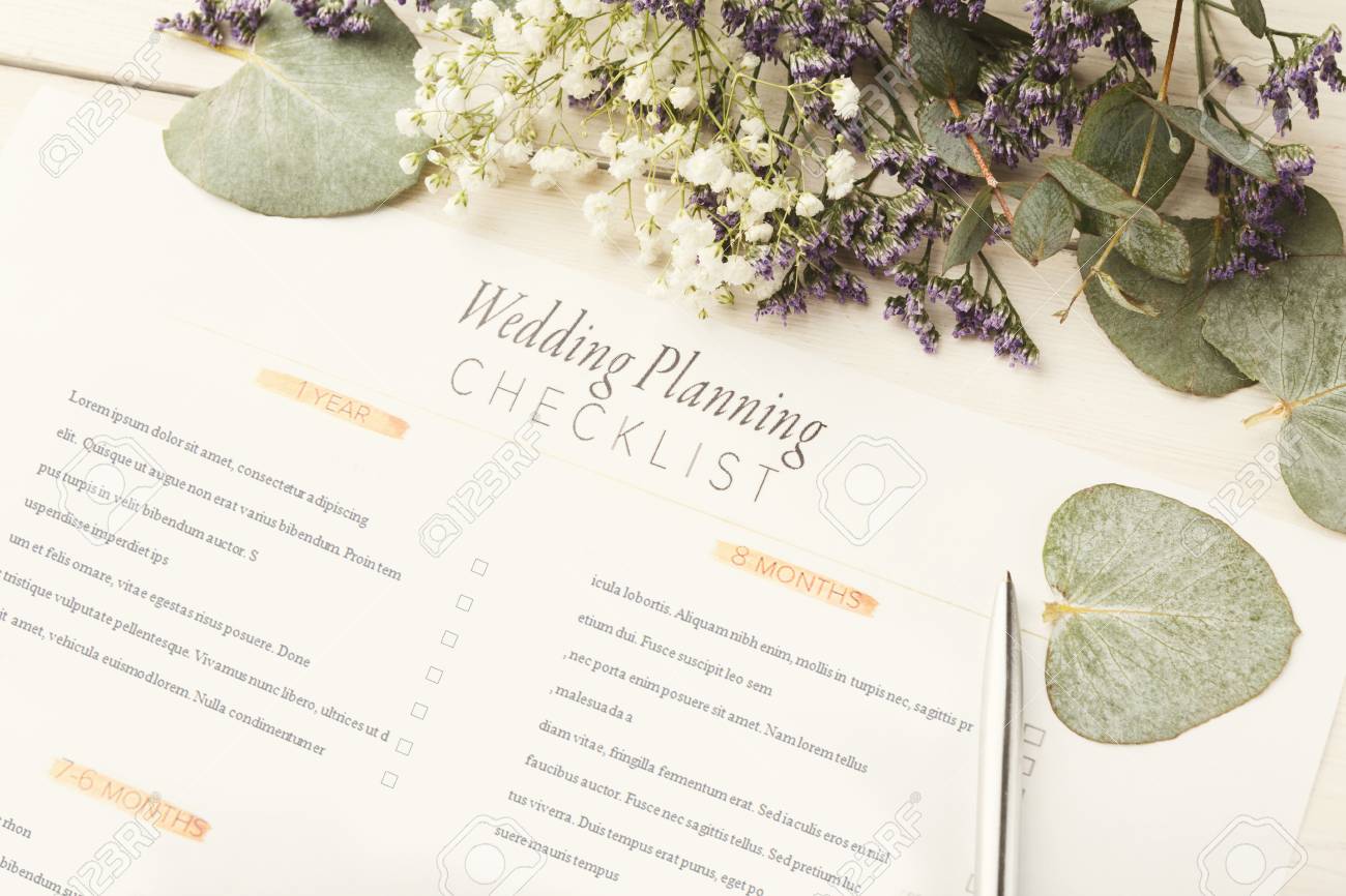 wedding background with checklist paper planner and cute flowers