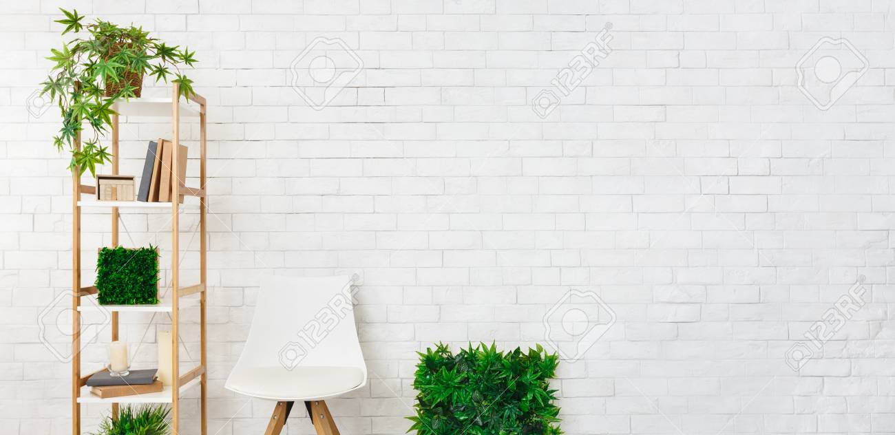 Shelving With House Plants And Scandinavian Chair At White Brick Stock Photo Picture And Royalty Free Image Image 118460804