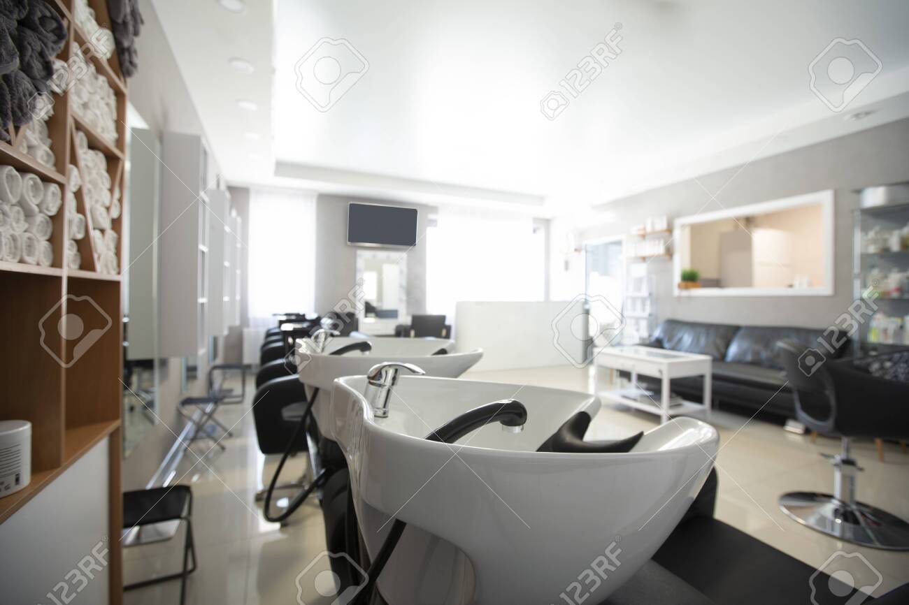 Focus on sink for washing hair. Beauty salon inside - 143325554 Focus on sink for washing hair. Beauty salon inside - 143325554