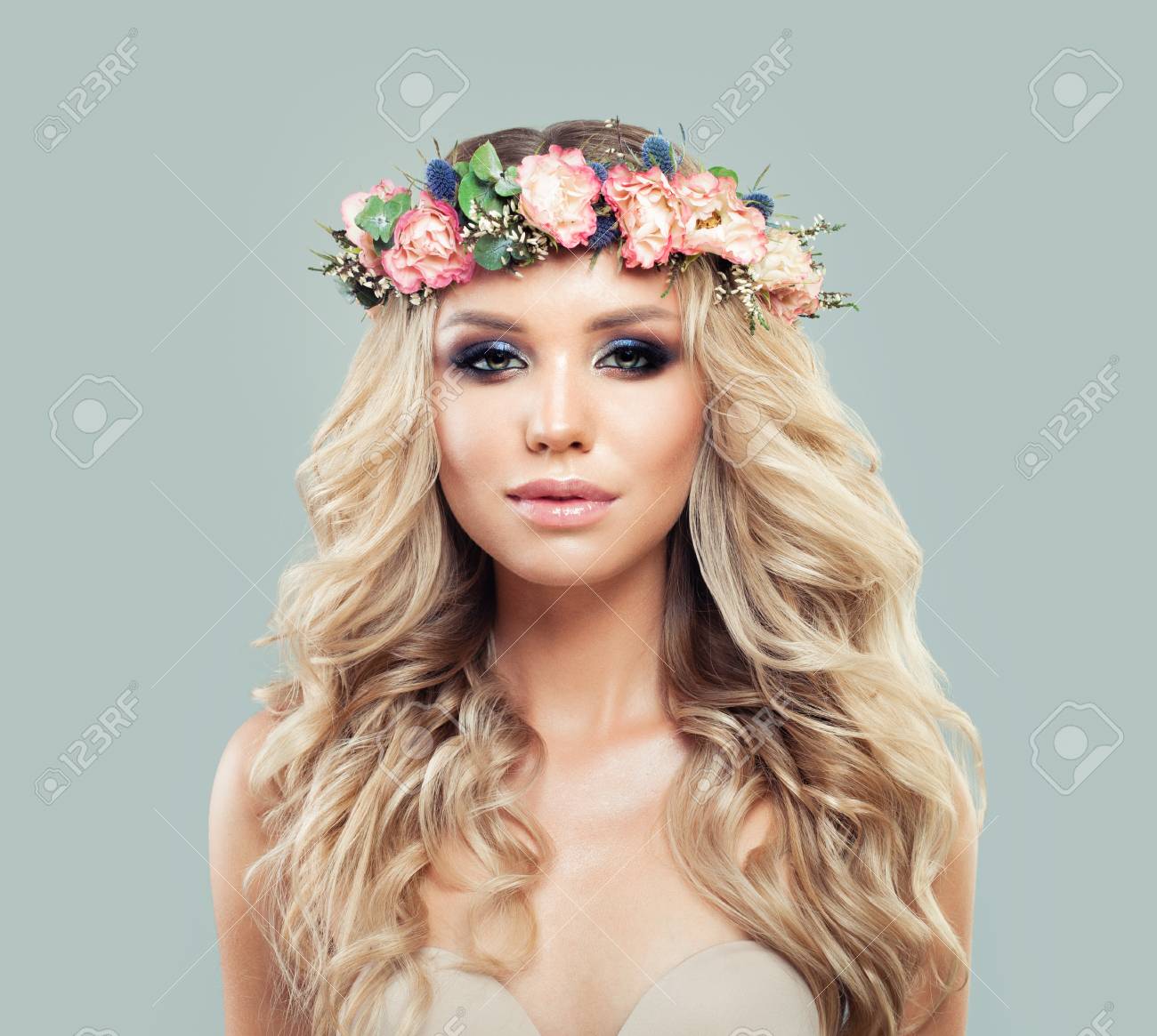 perfect young woman with long wavy hair and flowers blonde beauty stock photo picture and royalty free image image 94293346