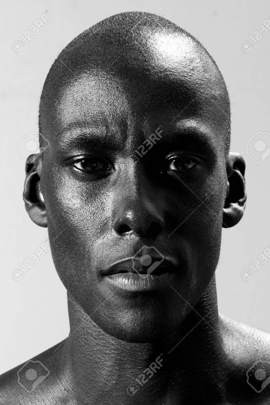 Close up black and white photo of man staring stock photo 96298738