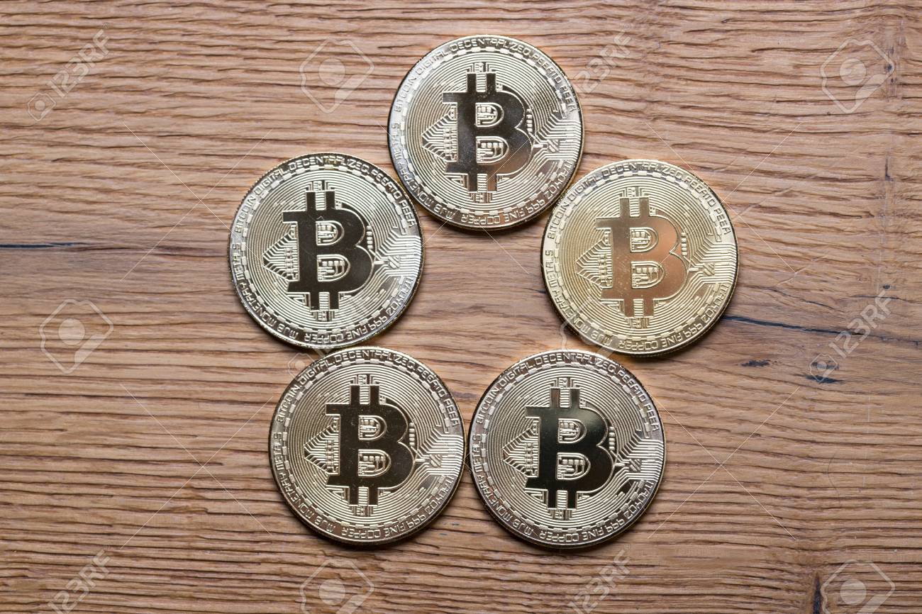 Physical Bitcoin Coins On Wooden Background - 