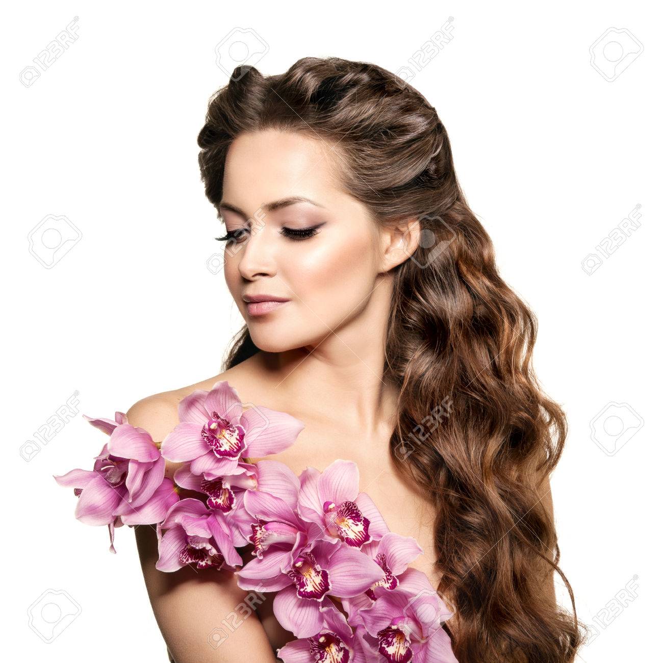 Beauty Young Woman Luxury Long Curly Hair With Orchid Flower