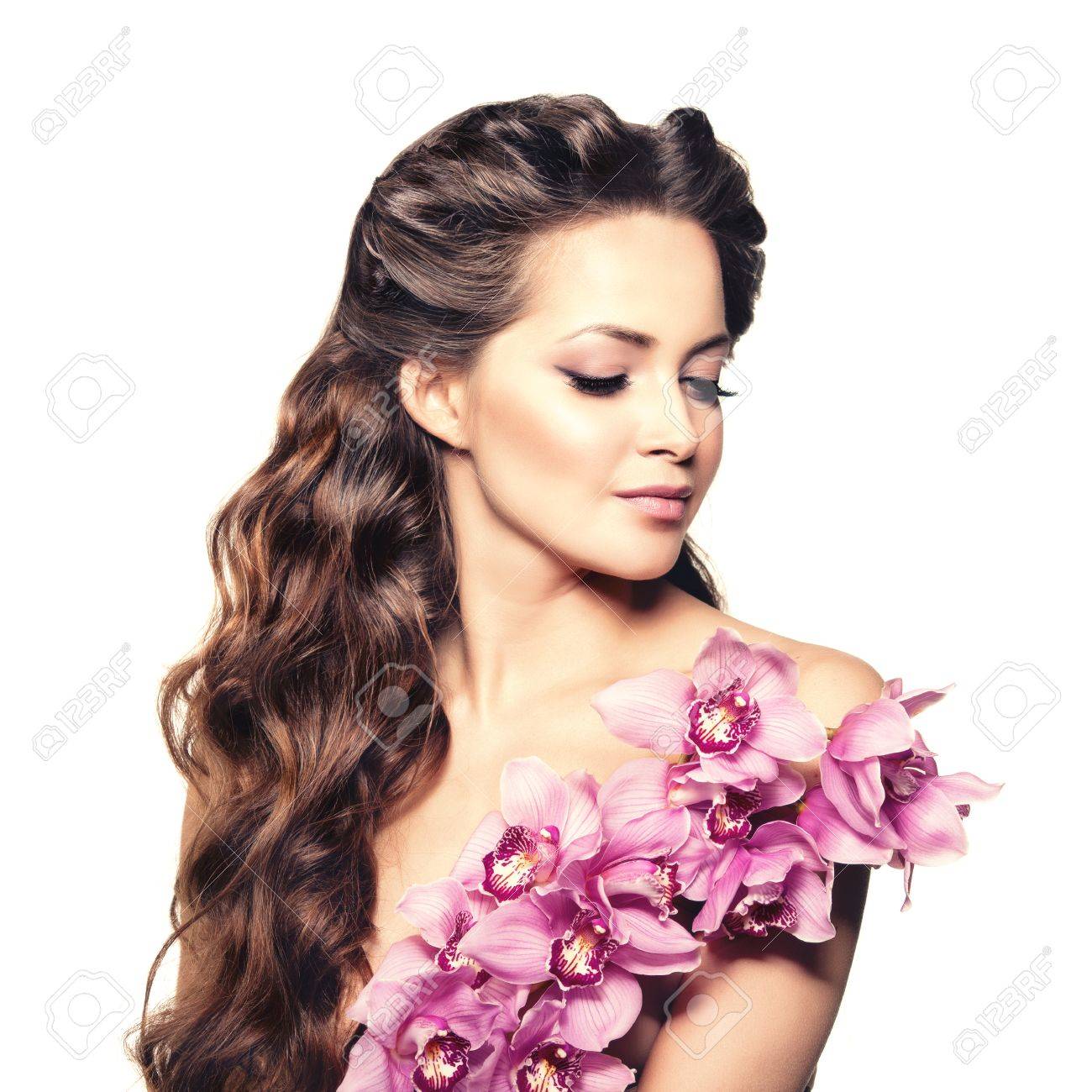 Beauty Young Woman Luxury Long Curly Hair With Orchid Flower