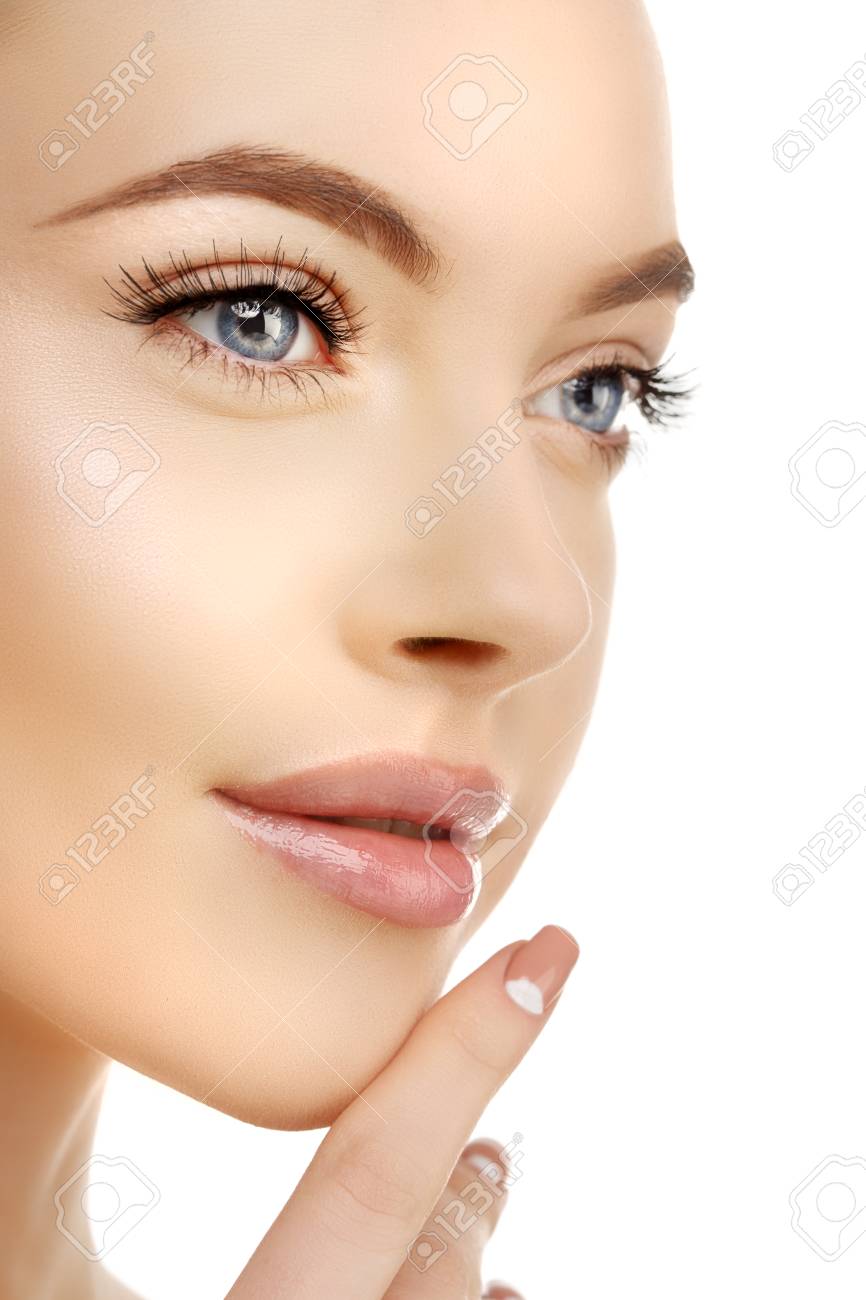 Young Beauty Woman With Clean Fresh Glowing Skin. Beautiful Girl