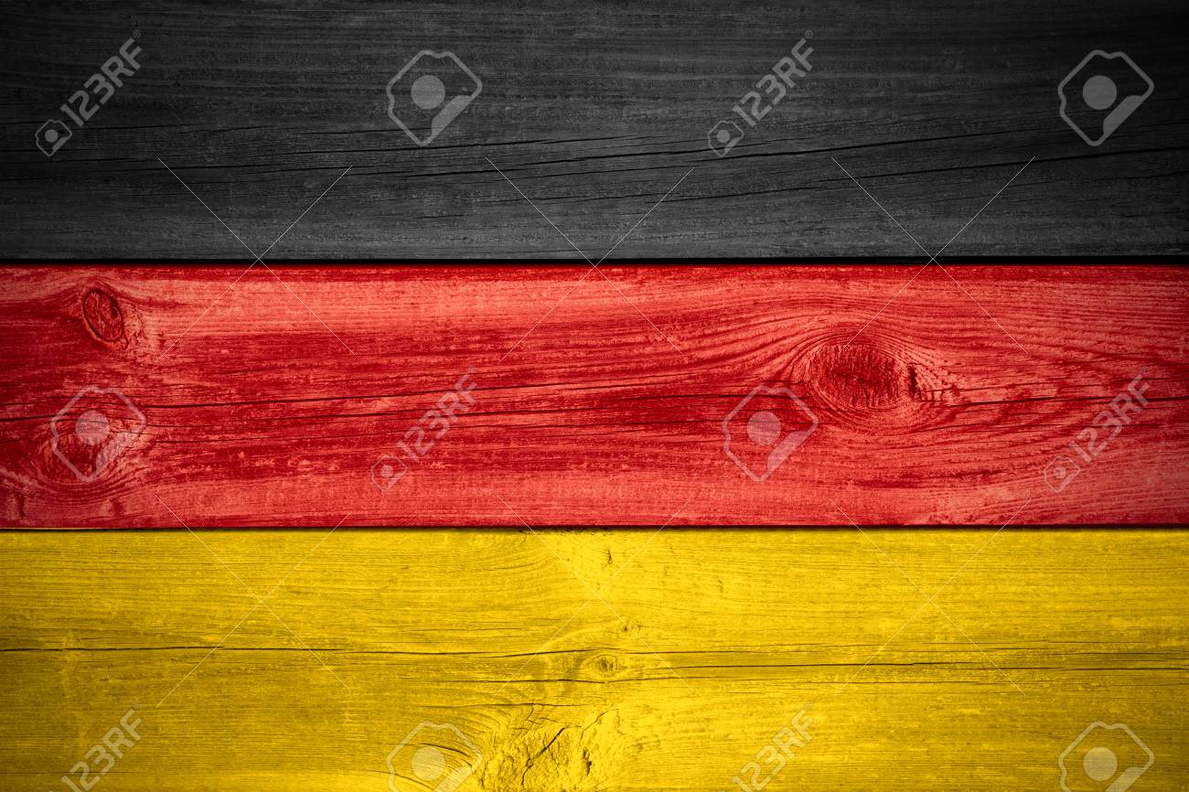 flag of germany or german banner on wooden background stock photo