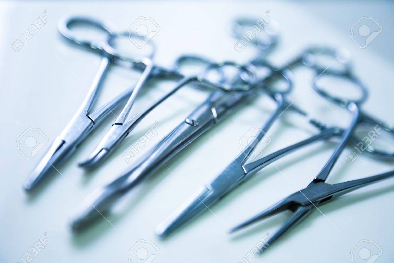 medical clamp instruments on table with shallow depth of field - 13320205 medical clamp instruments on table with shallow depth of field - 13320205