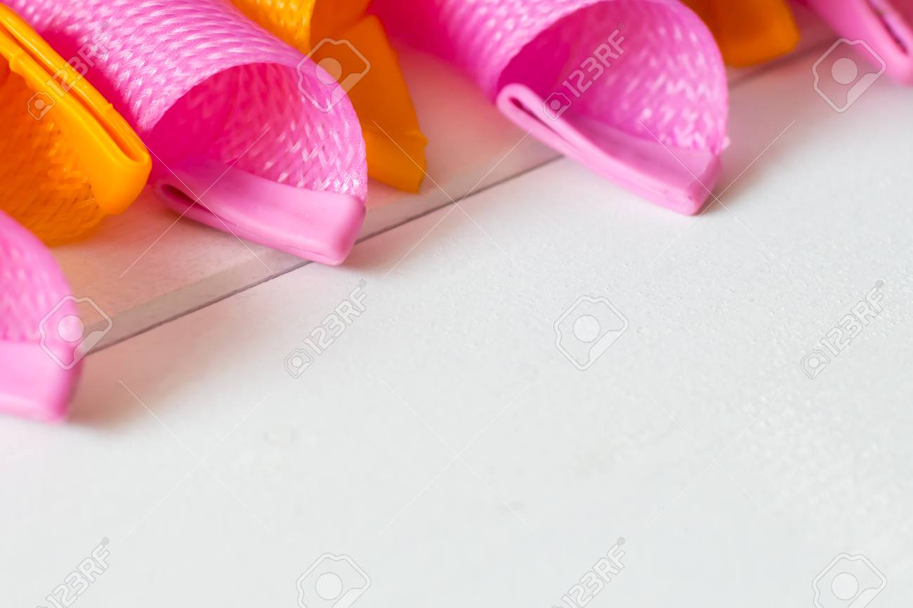 Magic Leverag Curlers Pink And Orange Hair Curlers On Light
