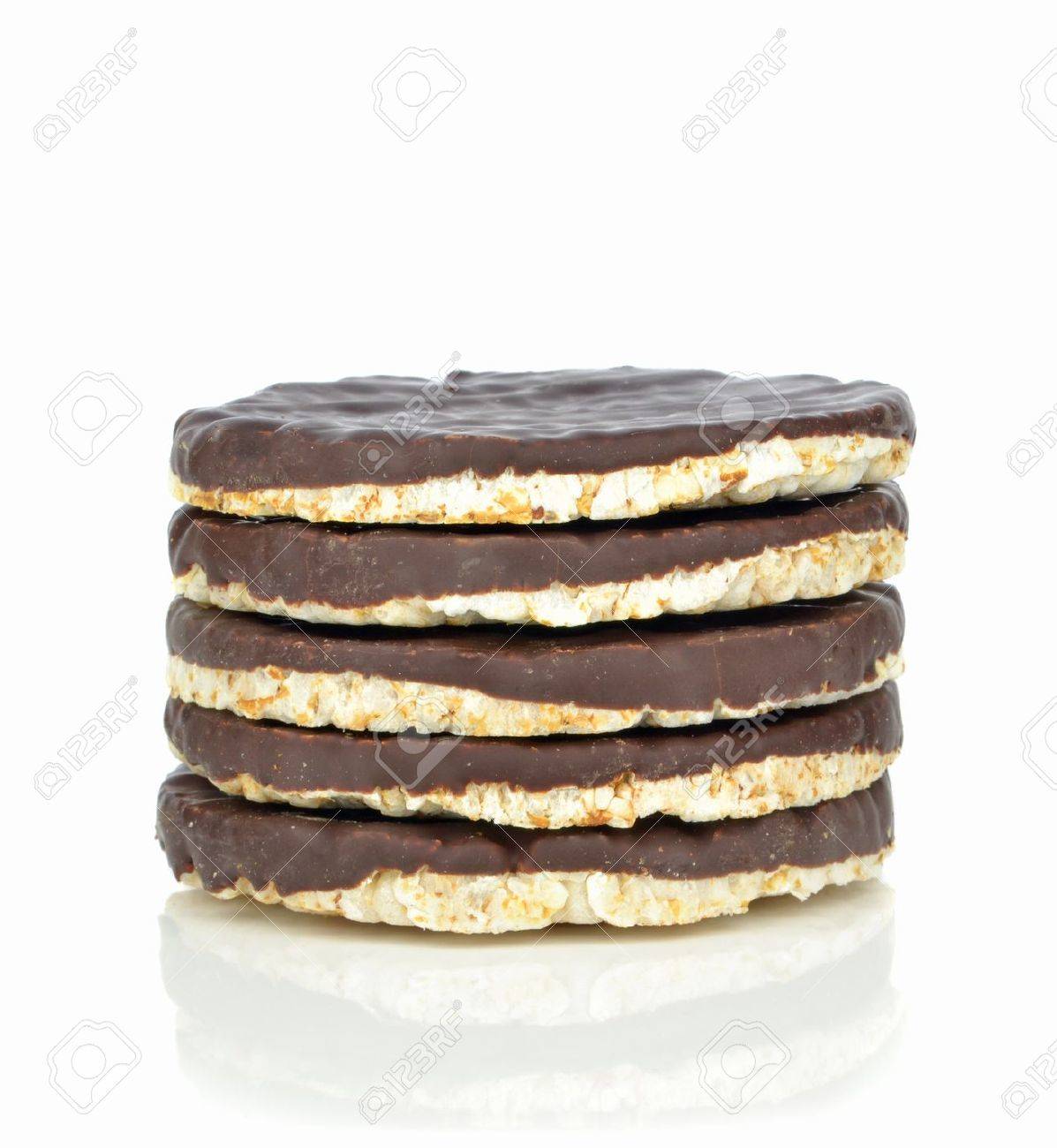 A stack of chocolate coated rice cakes on white background