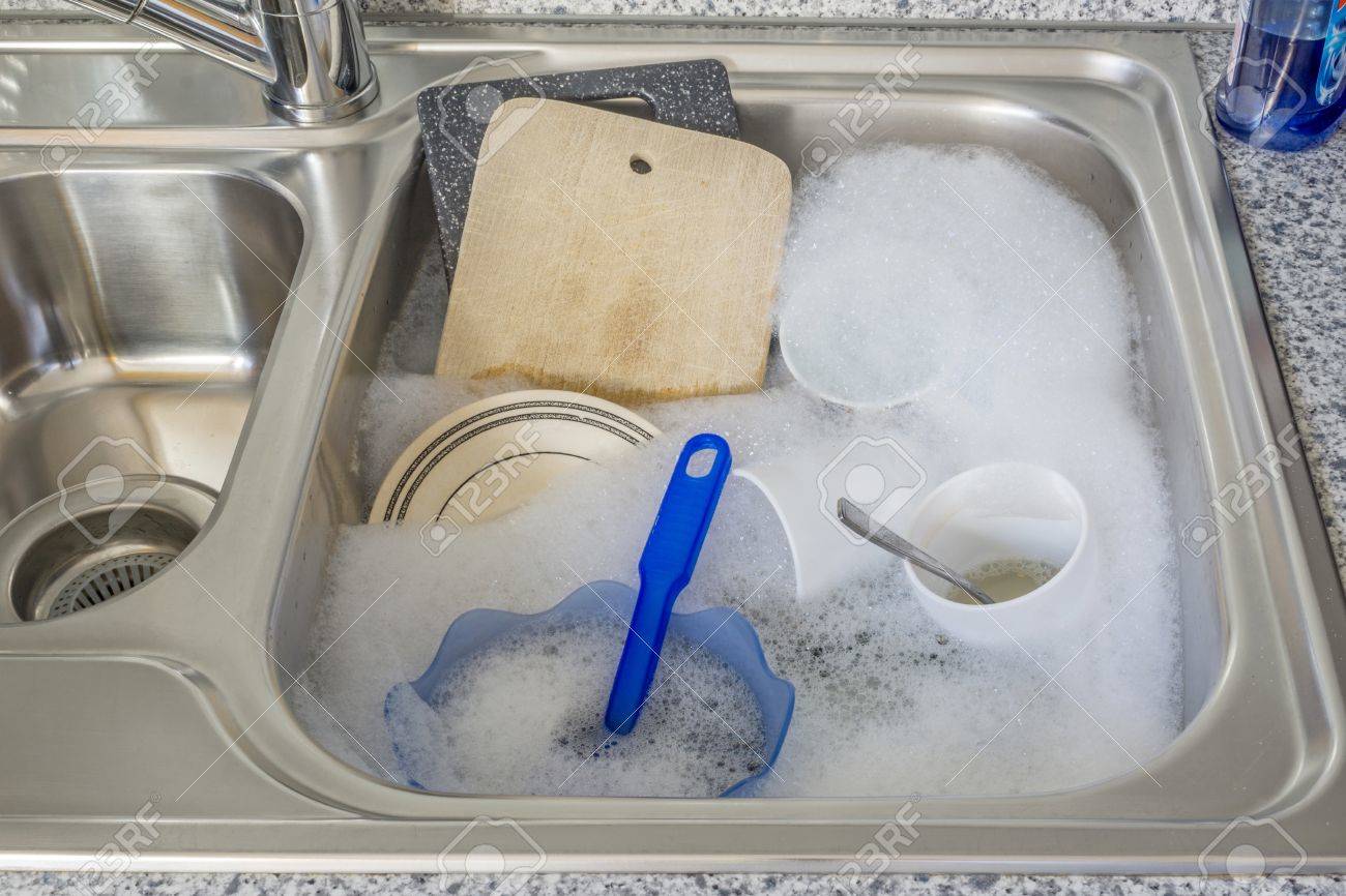 Kitchen Sink With Dishes dirty dishes in soapy water in a kitchen sink stock photo, picture Kitchen Sink With Dishes dirty dishes in soapy water in a kitchen sink stock photo, picture