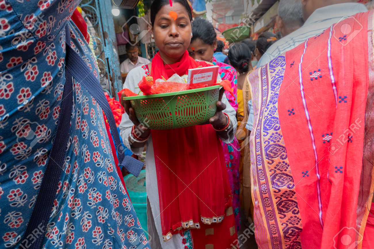 R.N.MitraYoung Hindu Married Woman Carrying