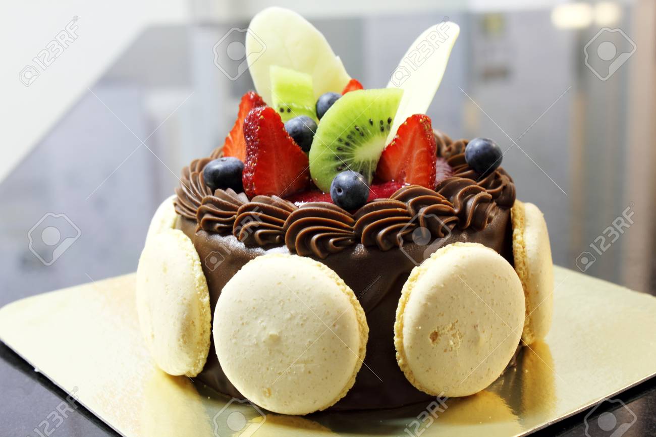 Chocolate Cake Decorations With Macaroon And Freshfruit Stock Photo Picture And Royalty Free Image Image