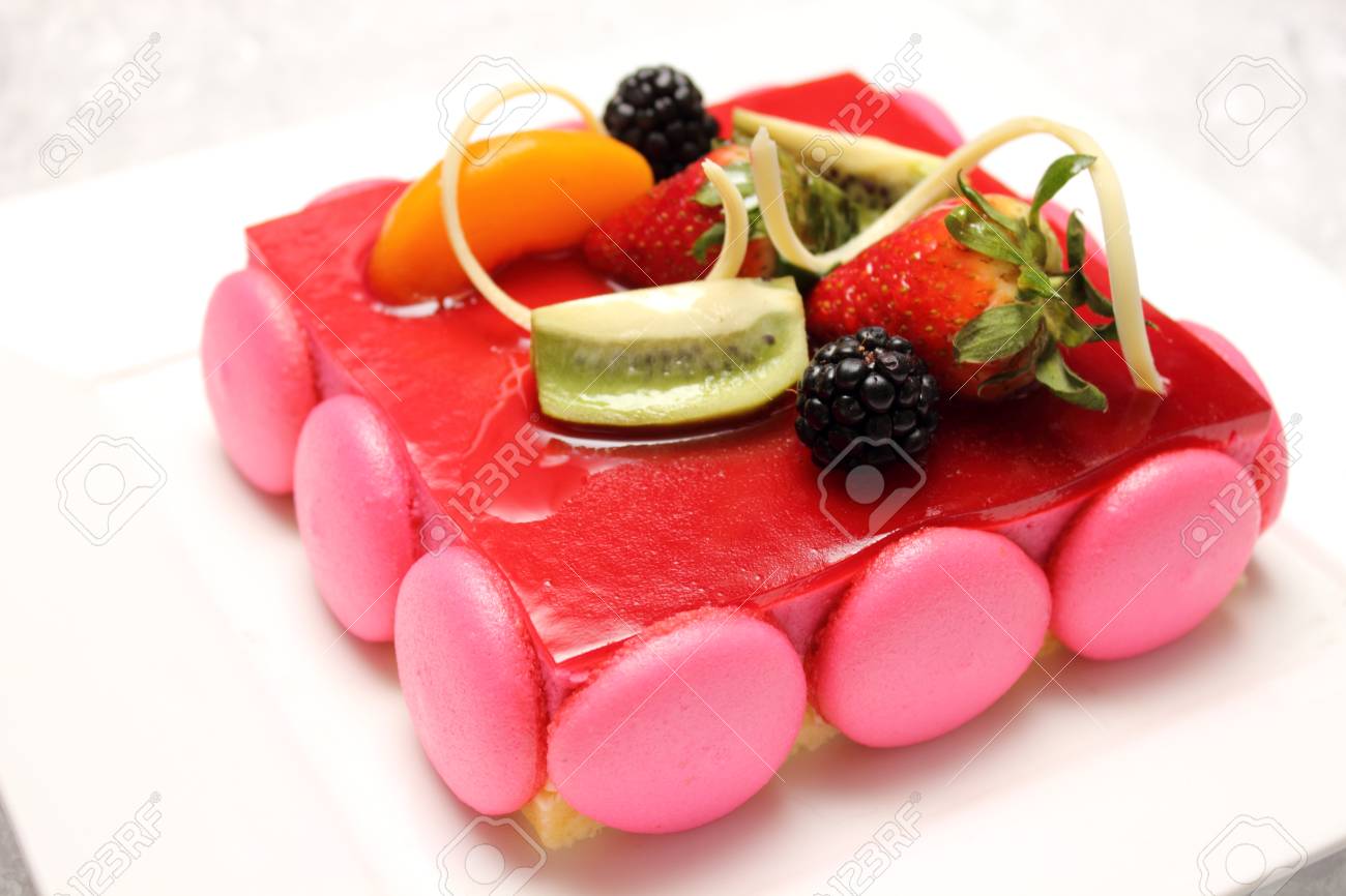 stock photo strawberry cake on the kitchen table with additional macaroon decoration - Strawberry Kitchen Decoration stock photo strawberry cake on the kitchen table with additional macaroon decoration - Strawberry Kitchen Decoration