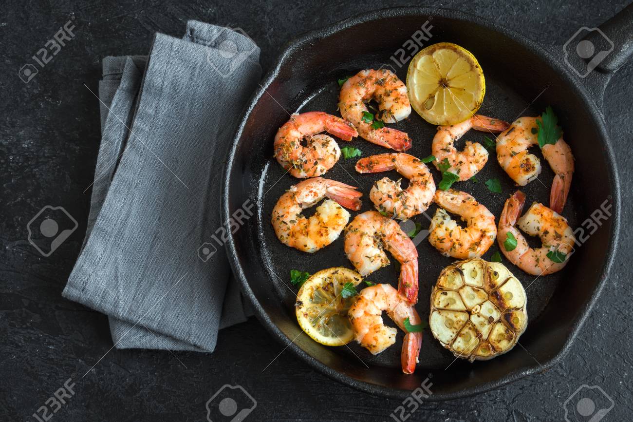 Roasted Shrimps With Lemon Garlic And Herbs Seafood Shelfish Stock Photo Picture And Royalty Free Image Image 95401060