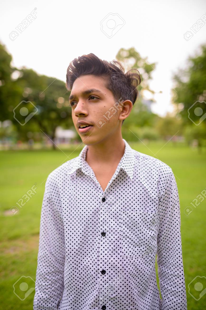 Portrait Of Young Indian Teenage Boy Relaxing At The Park In The City Of  Bangkok, Thailand Stock Photo, Picture and Royalty Free Image. Image  107068570., image size:867x1300