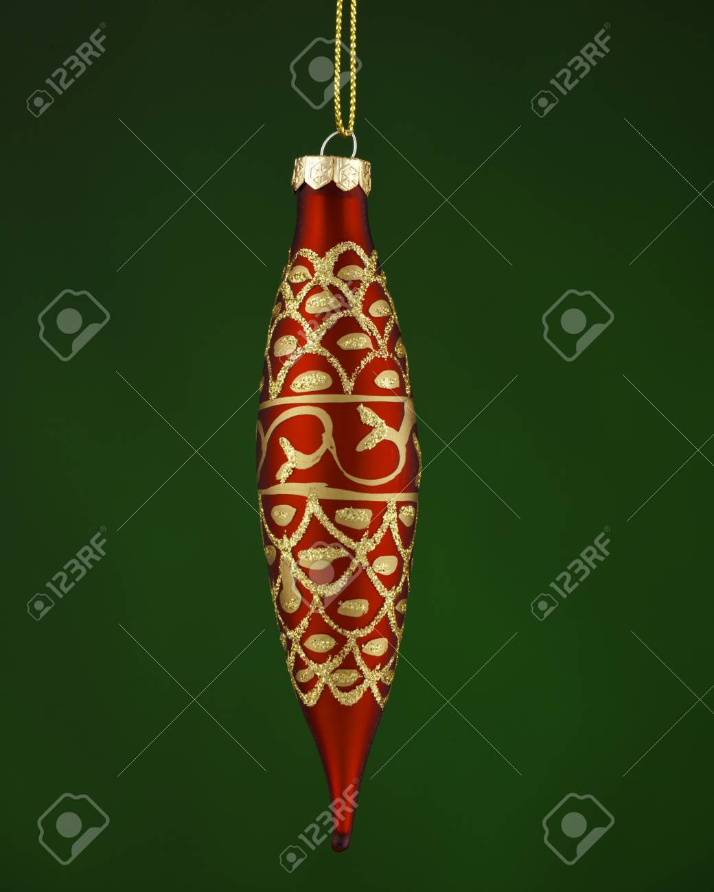 A Red And Gold Teat Drop Shaped Christmas Tree Ornament Isolated Stock Photo Picture And Royalty Free Image Image 8193680