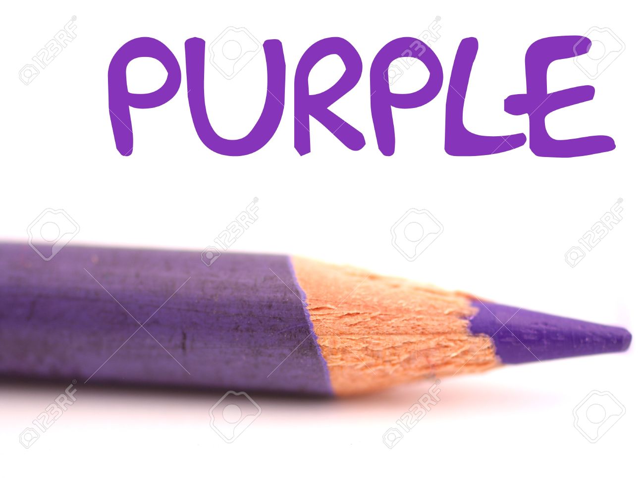 closeup of purple pencil crayon with the word purple above it